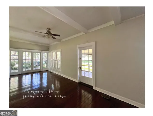 a bathroom with a sink a mirror and a shower