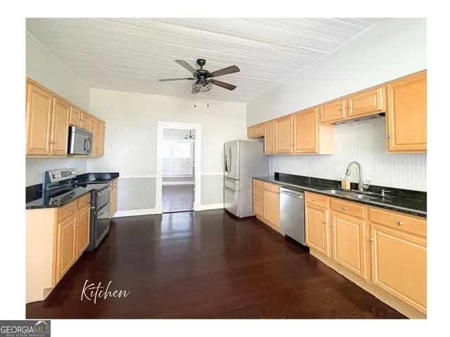 a view of a chairs and table on the terrace