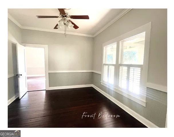 a view of house with outdoor space and sitting area