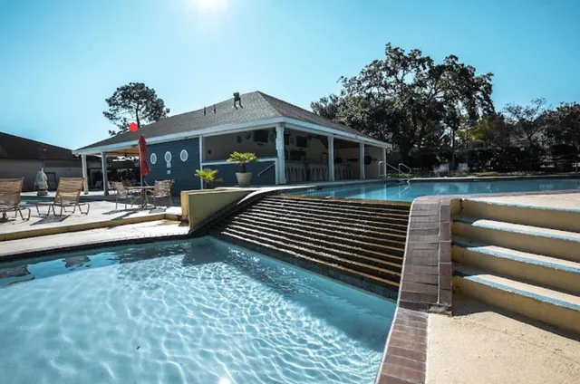 a view of a terrace with sitting area