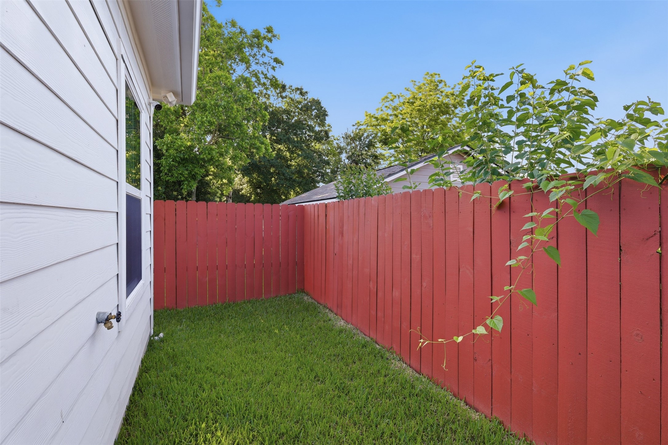 4606 Mallow Street, Unit A Houston, TX 77051 - Photo 19 of 21 a view of yard with wooden fence