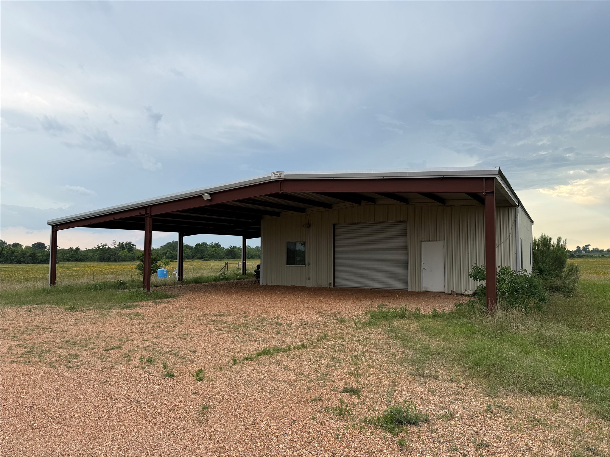 1240 Crooked Road Cat Spring, TX 78933 - Photo 8 of 20 an empty room with yard