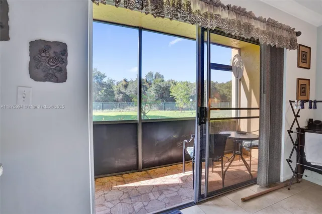 a view of a swimming pool with an outdoor seating