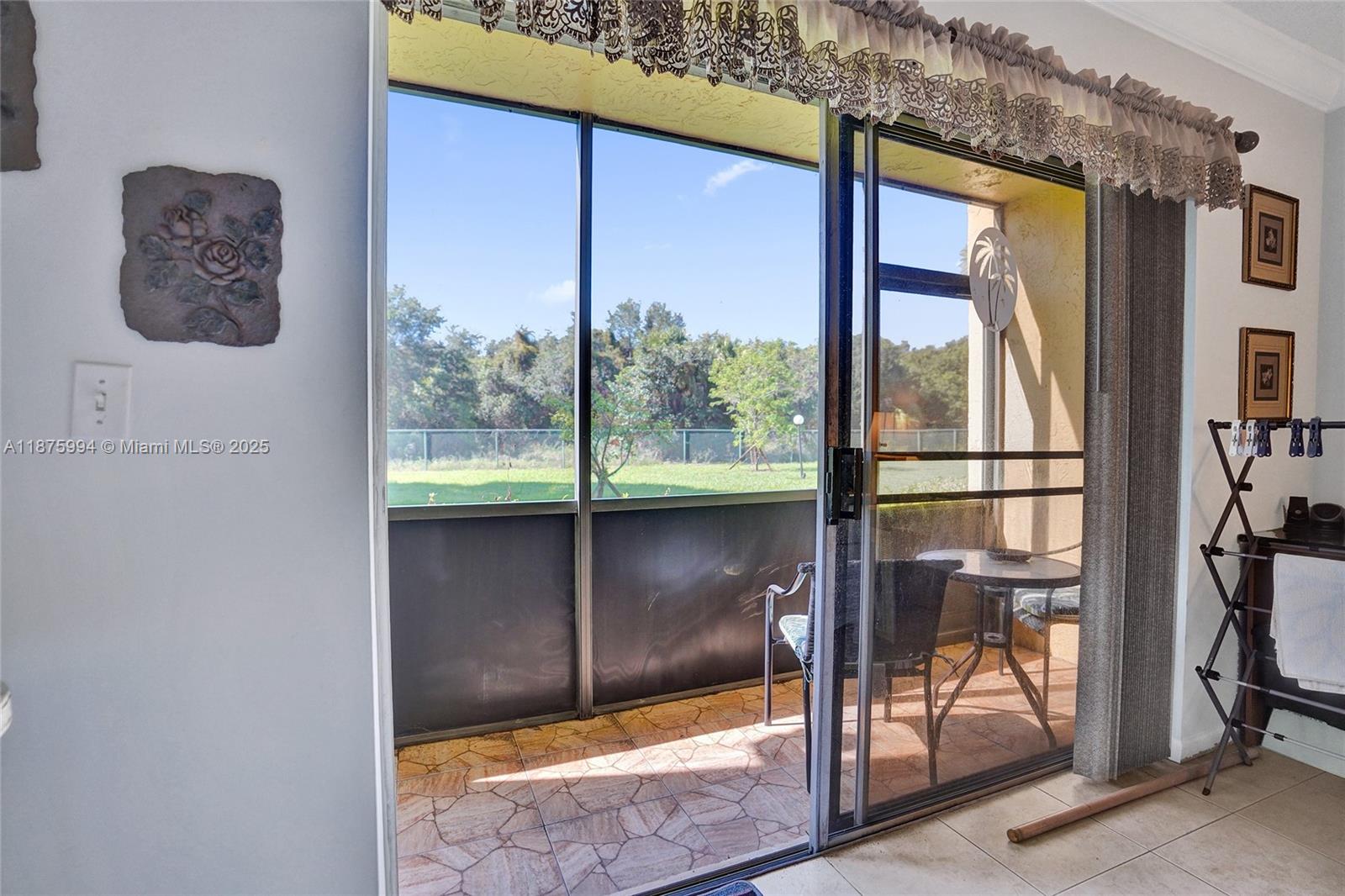 2975 Southwest 22nd Avenue, Unit 102 Delray Beach, FL 33445 - Photo 47 of 73 a view of front door