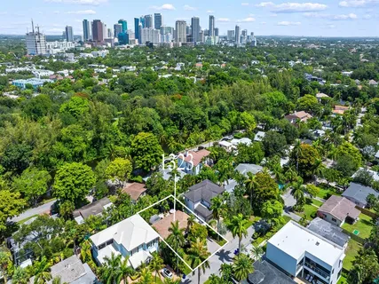 an aerial view of a city with lots of residential buildings