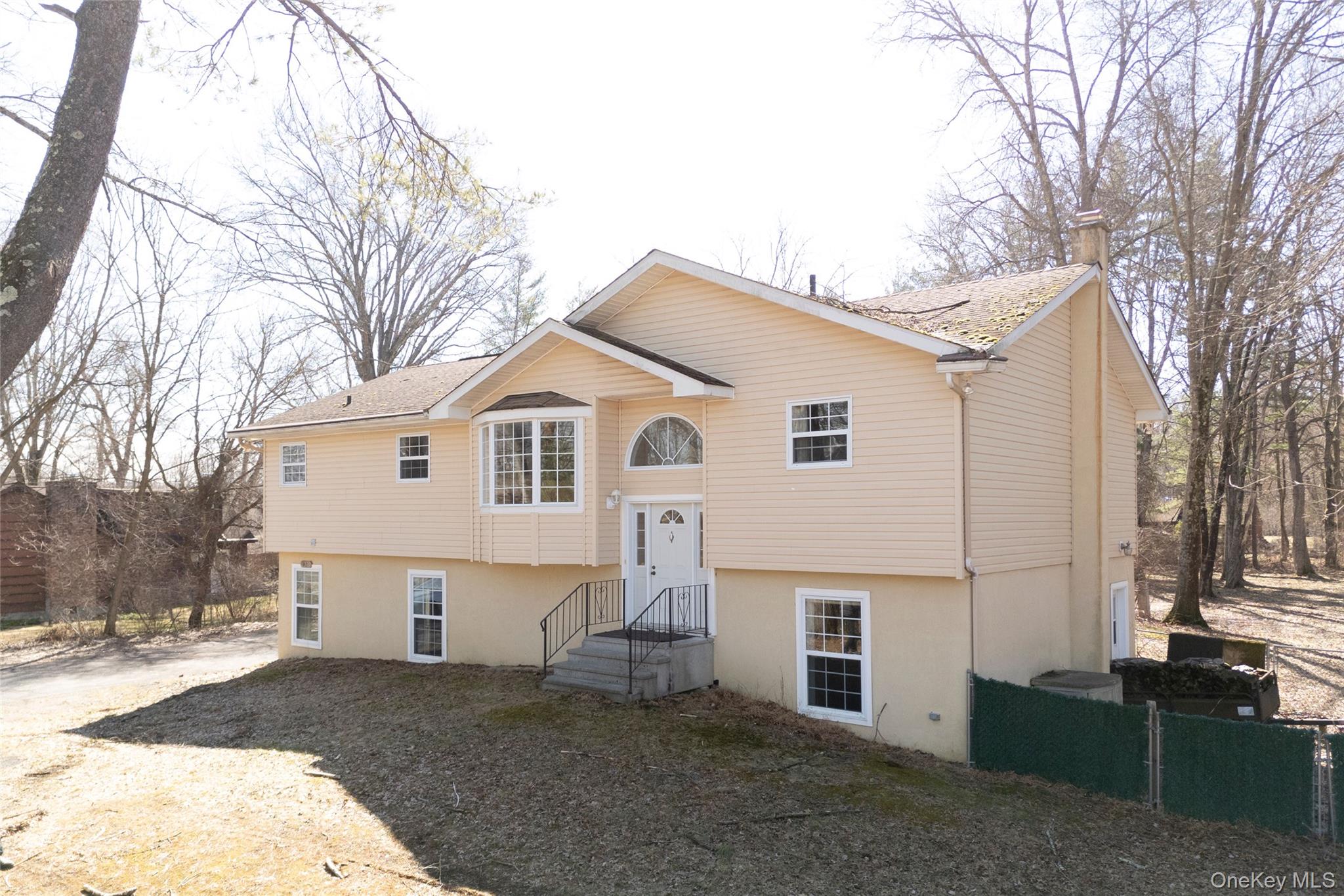212 Rhinecliff Road Rhinebeck, NY 12572 - Photo 1 of 18 a view of a white house with a yard