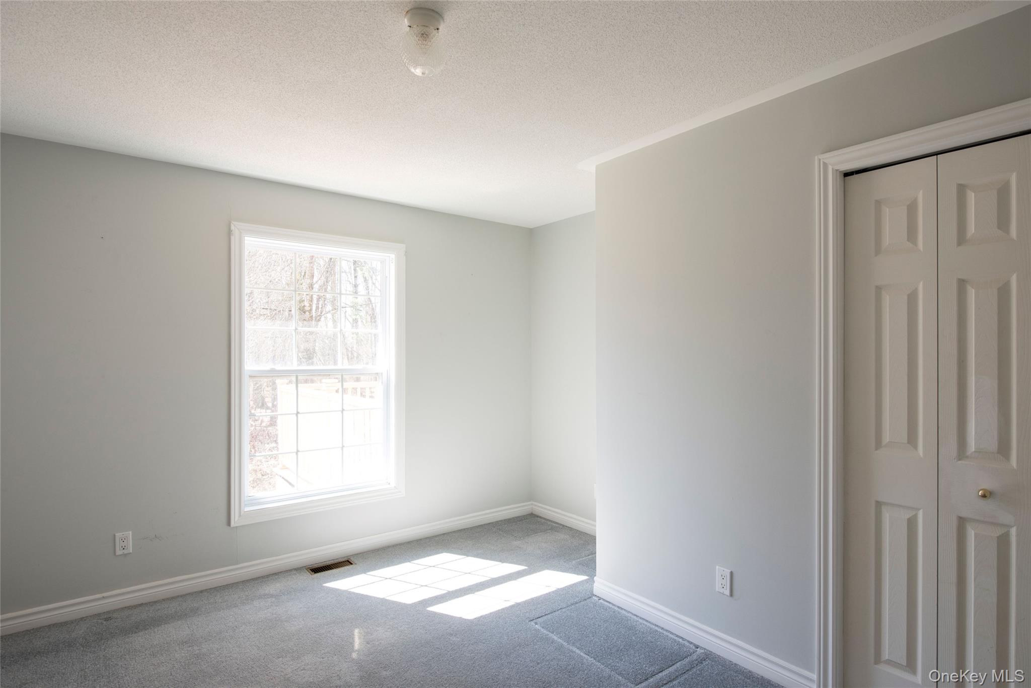 212 Rhinecliff Road Rhinebeck, NY 12572 - Photo 11 of 18 an empty room with windows