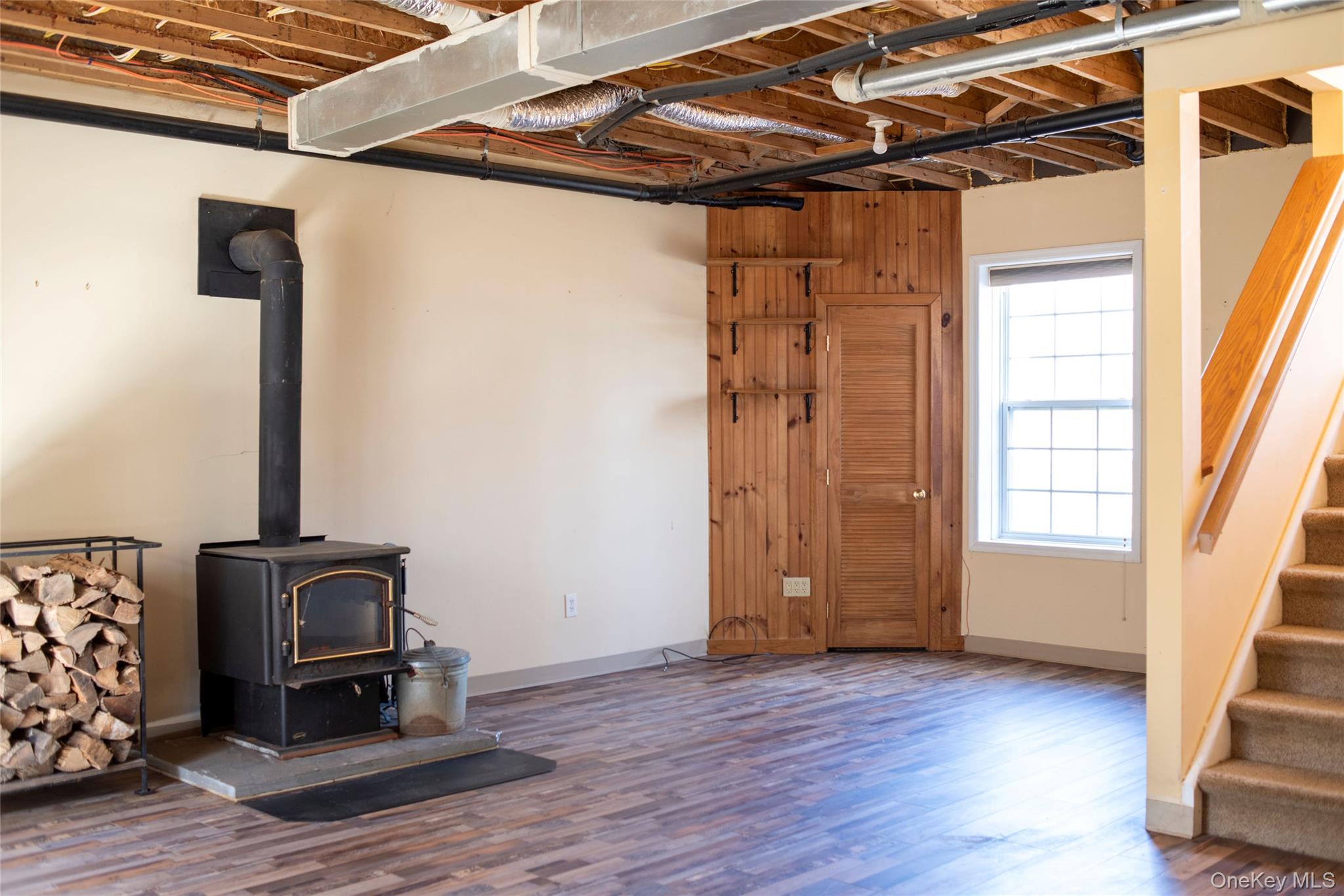 212 Rhinecliff Road Rhinebeck, NY 12572 - Photo 14 of 18 a view of a room with wooden floor and windows