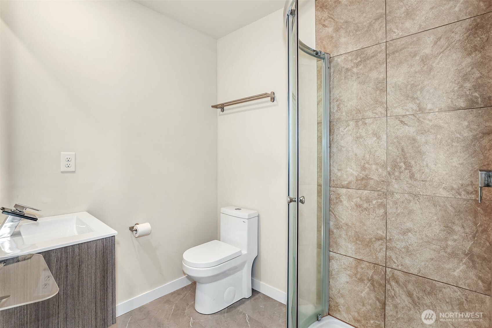 1400 North 95th Street Seattle, WA 98103 - Photo 15 of 27 a bathroom with a toilet and a sink