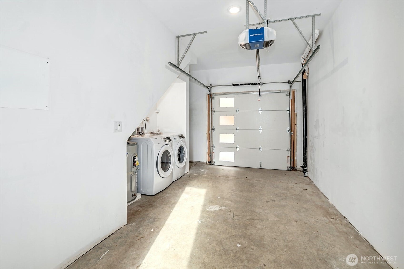 1400 North 95th Street Seattle, WA 98103 - Photo 19 of 27 a view of a storage & utility room with washer and dryer
