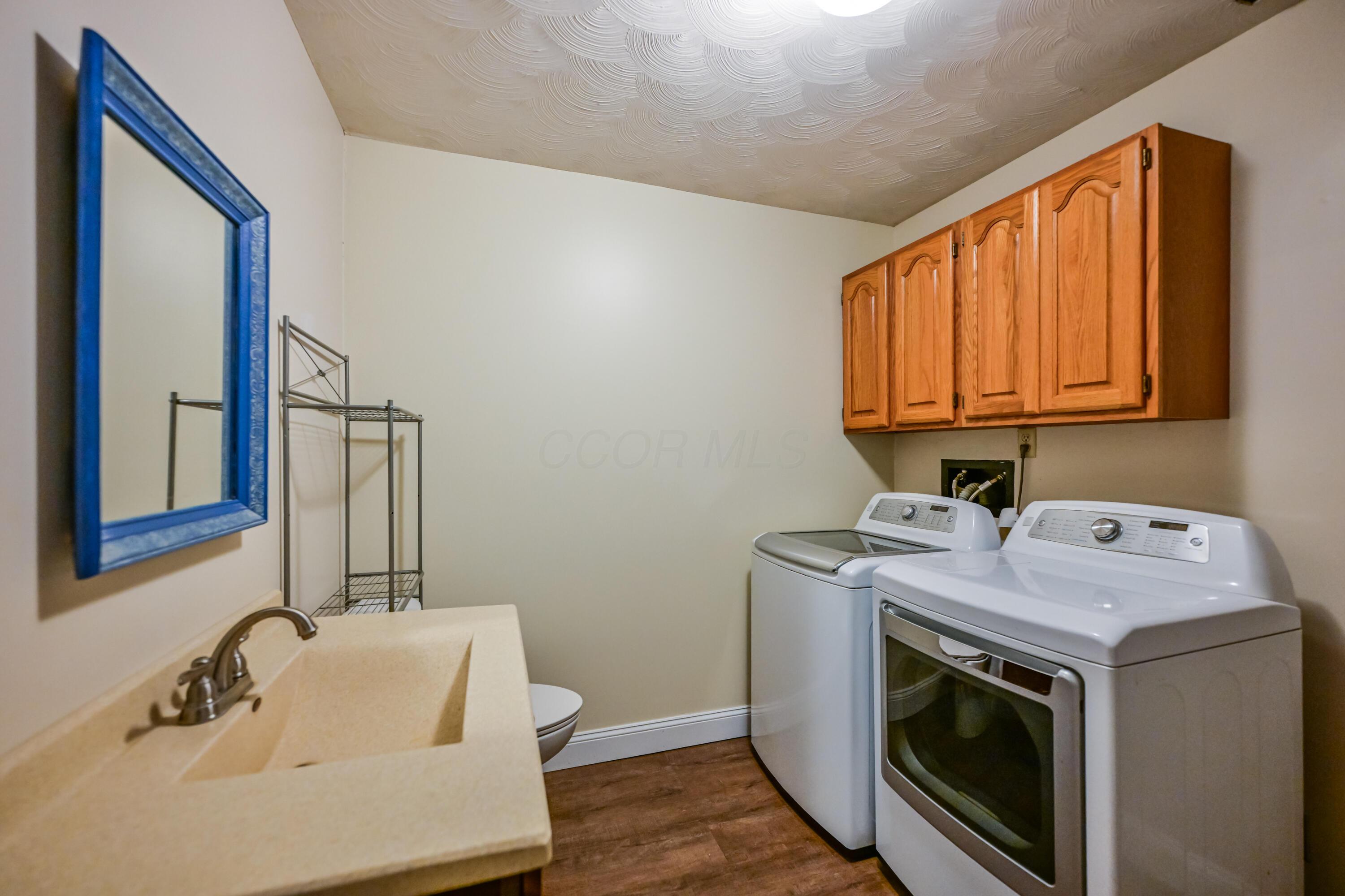 6908 Lemaster Road Athens, OH 45701 - Photo 28 of 46 half bath and laundry