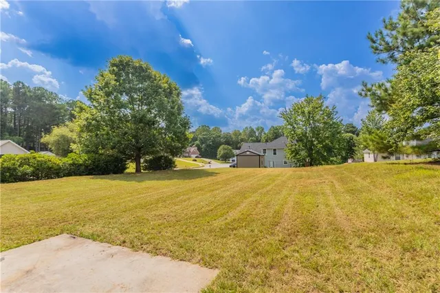 a view of an ocean and a yard