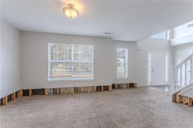 an empty room with windows