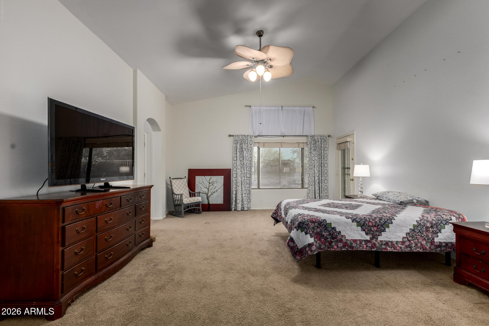 935 West Gascon Road San Tan Valley, AZ 85143 - Photo 18 of 43 a bedroom with a bed and a flat screen tv