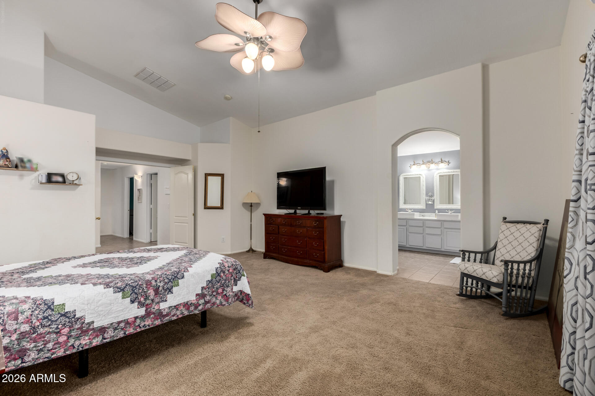 935 West Gascon Road San Tan Valley, AZ 85143 - Photo 20 of 43 a bedroom with a bed and a television