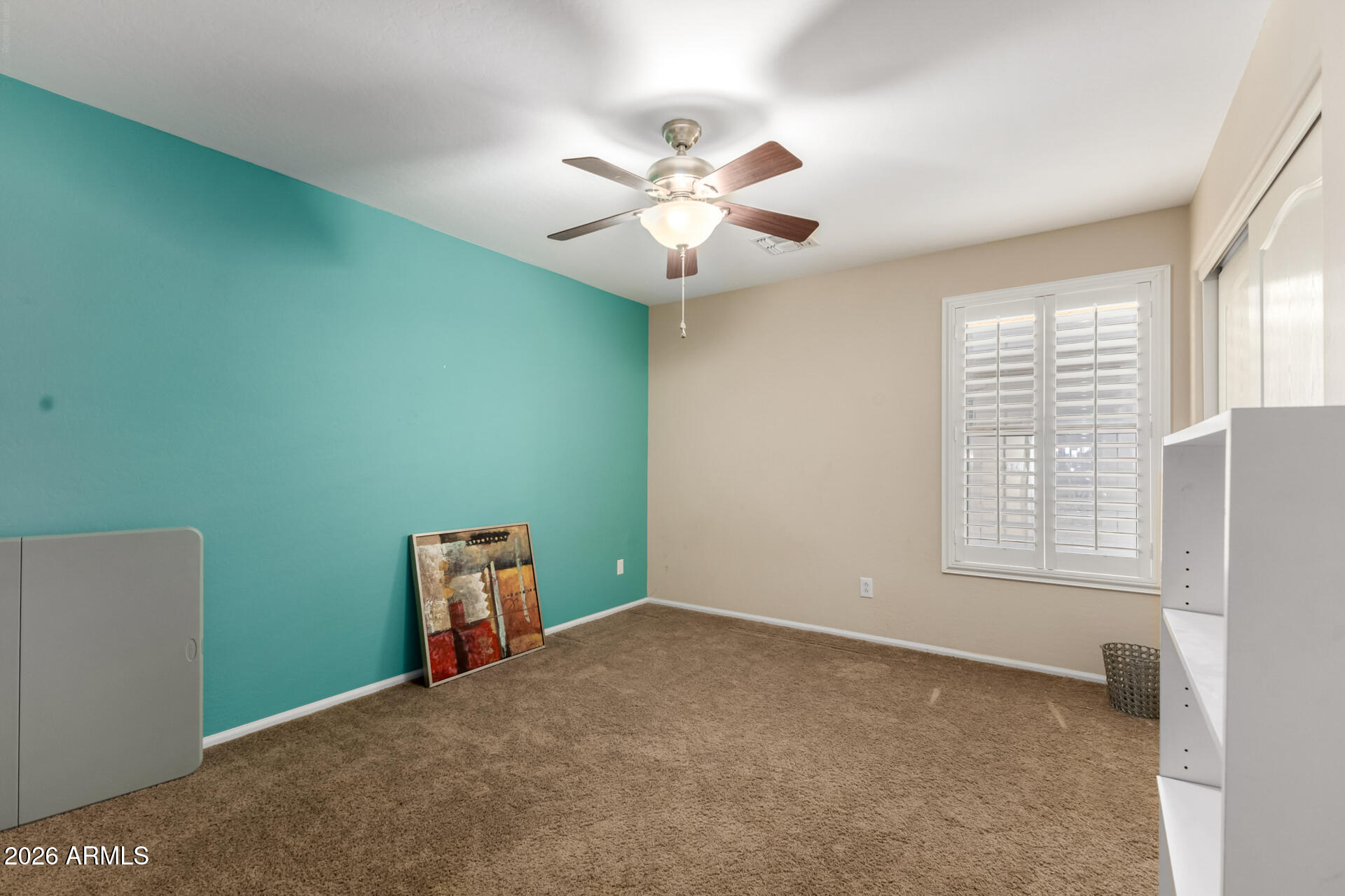 935 West Gascon Road San Tan Valley, AZ 85143 - Photo 23 of 43 a view of an empty room with a window