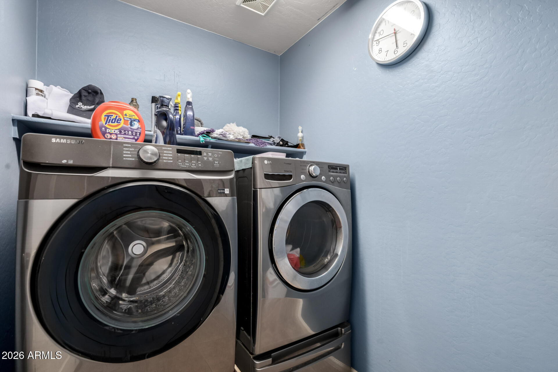 935 West Gascon Road San Tan Valley, AZ 85143 - Photo 27 of 43 a utility room with dryer and washer
