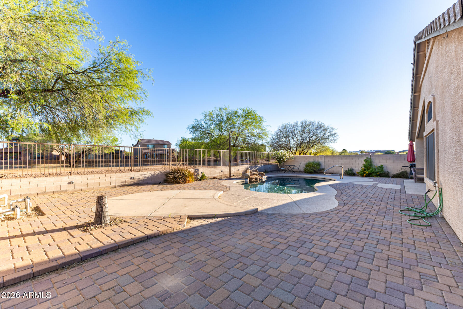 935 West Gascon Road San Tan Valley, AZ 85143 - Photo 29 of 43 a view of a yard and cars park