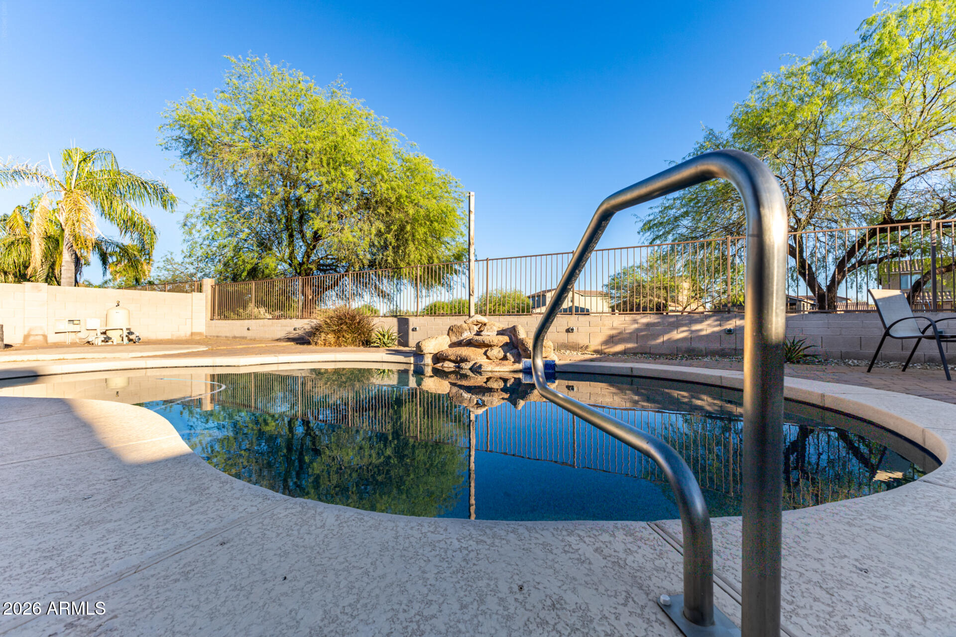 935 West Gascon Road San Tan Valley, AZ 85143 - Photo 32 of 43 a view of a swimming pool with a patio