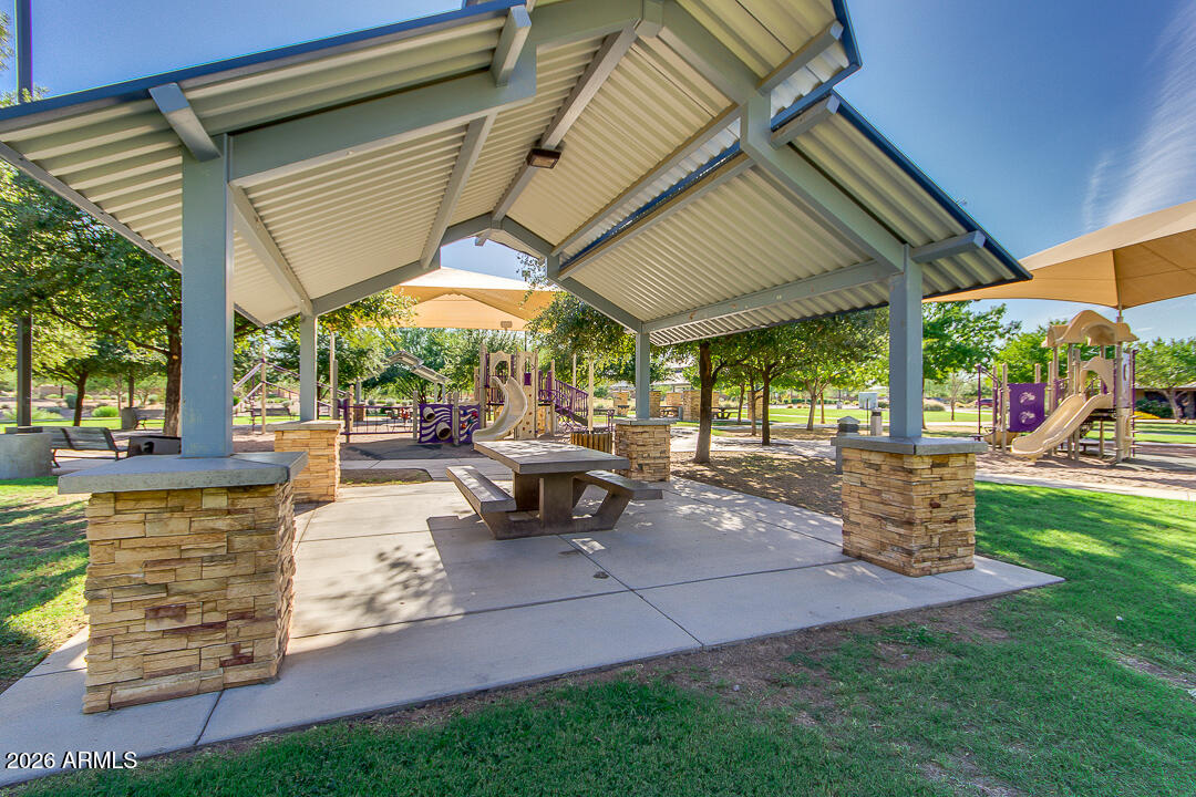 935 West Gascon Road San Tan Valley, AZ 85143 - Photo 40 of 43 a view of a backyard with sitting area