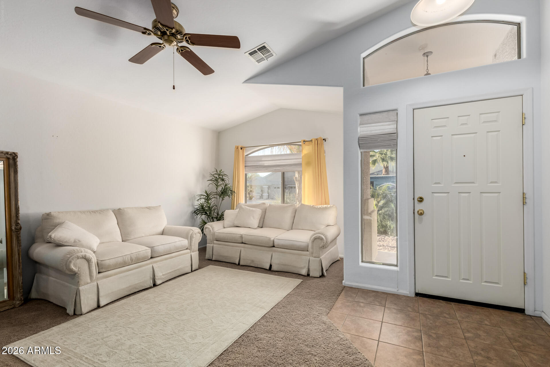 935 West Gascon Road San Tan Valley, AZ 85143 - Photo 5 of 43 a living room with furniture and a large window