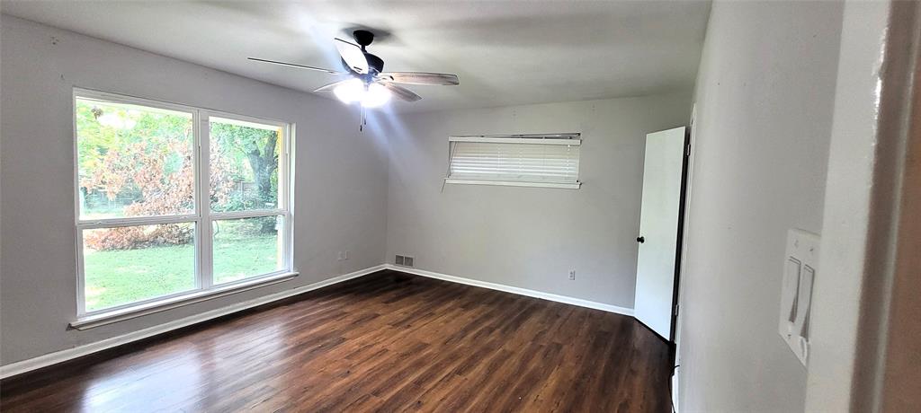 204 Overhill Drive Waxahachie, TX 75165 - Photo 24 of 40 a view of empty room with wooden floor and fan
