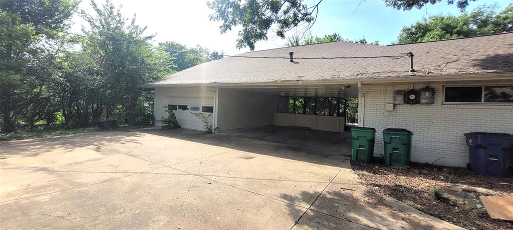 204 Overhill Drive Waxahachie, TX 75165 - Photo 39 of 40 a view of a white house with a outdoor space