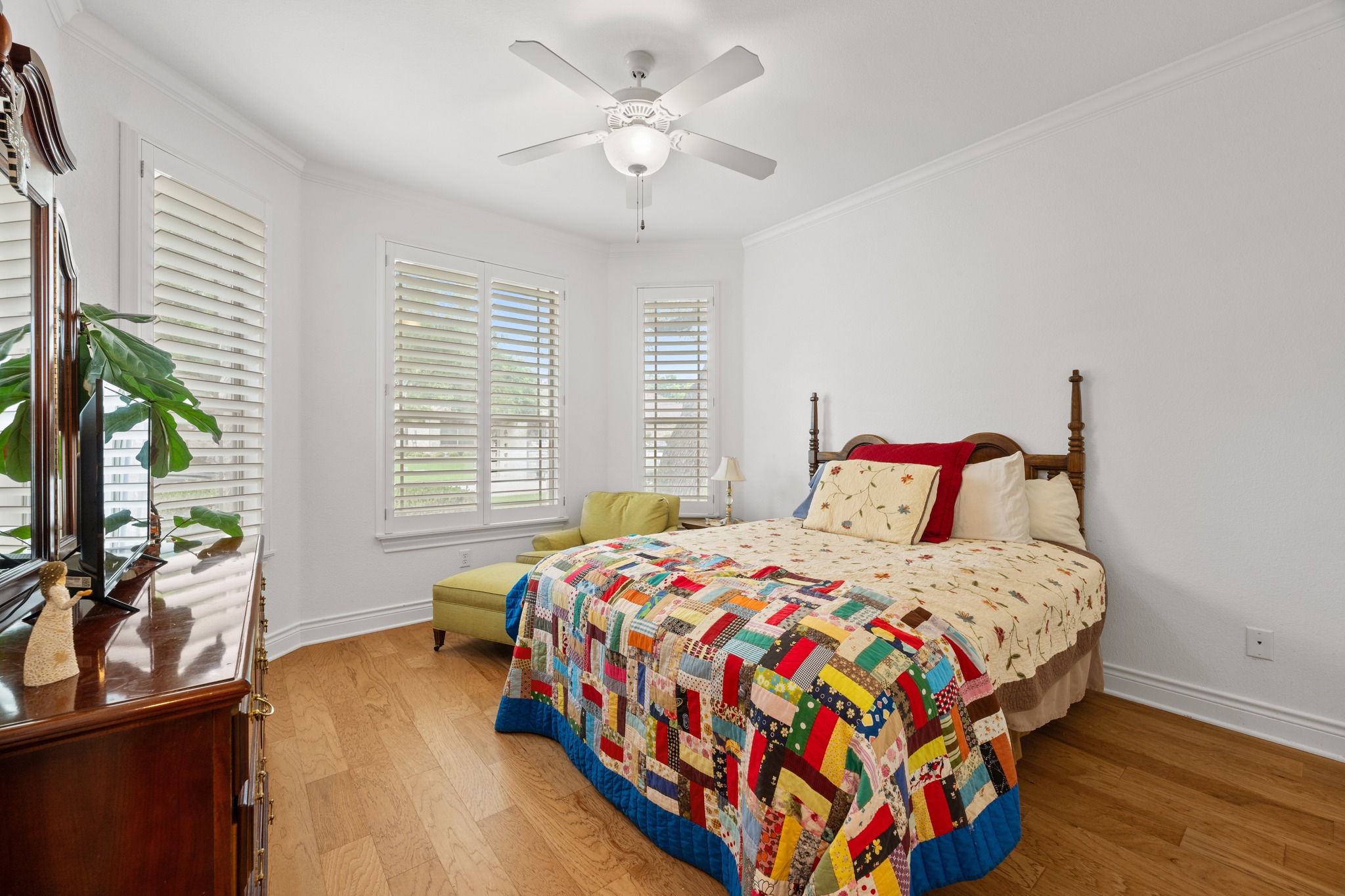 815 River Walk Trail Georgetown, TX 78633 - Photo 23 of 36 a bedroom with a bed and a flat tv screen on dresser