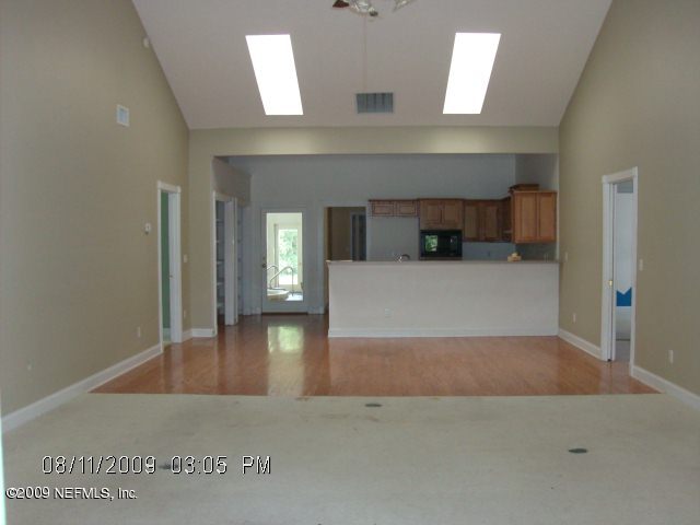 2190 Treasure Point Road Green Cove Springs, FL 32043 - Photo 4 of 13 living room to kitchen