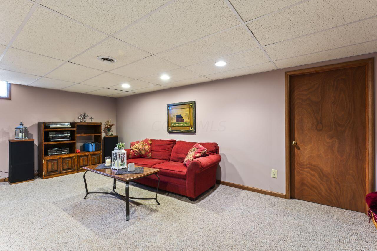 1550 Swans Road Northeast Newark, OH 43055 - Photo 44 of 65 Finished Basement Rec Room