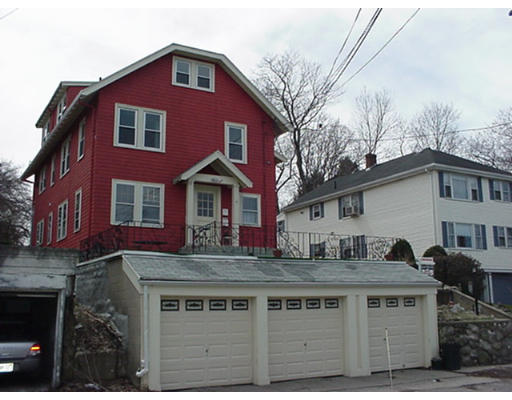 15 Sunset Road, Unit 1 Watertown, MA 02472 - Photo 1 of 1 a front view of residential houses