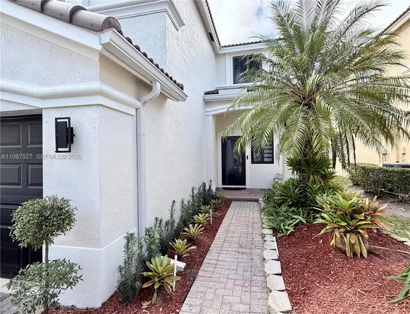 a front view of a house with a porch