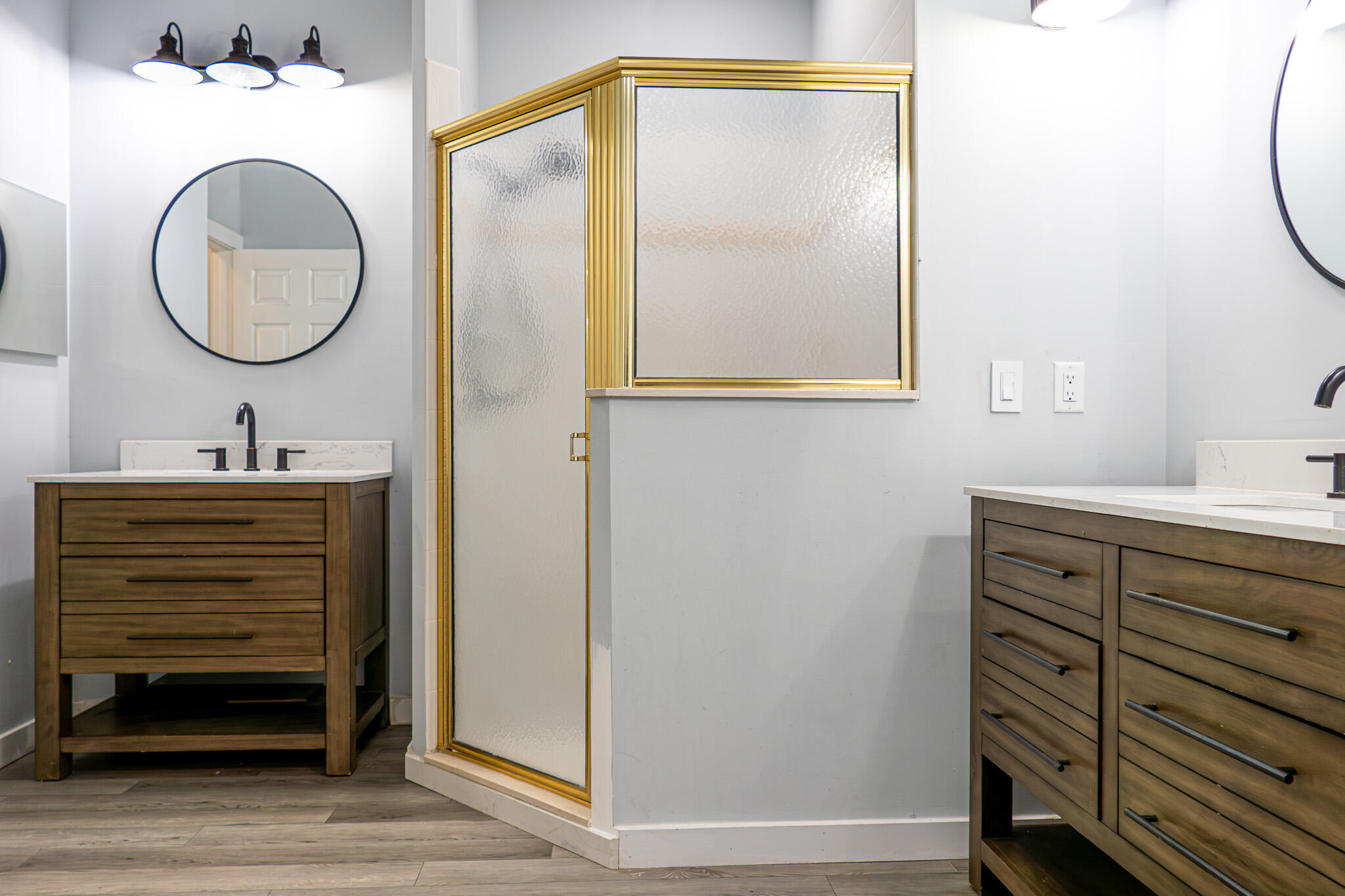 7685 Pleasant Ridge Court Stuart, FL 34997 - Photo 27 of 66 a bathroom with a sink a mirror and a shower