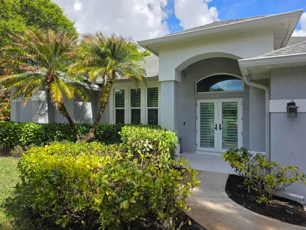 a view of a wooden floor and a window