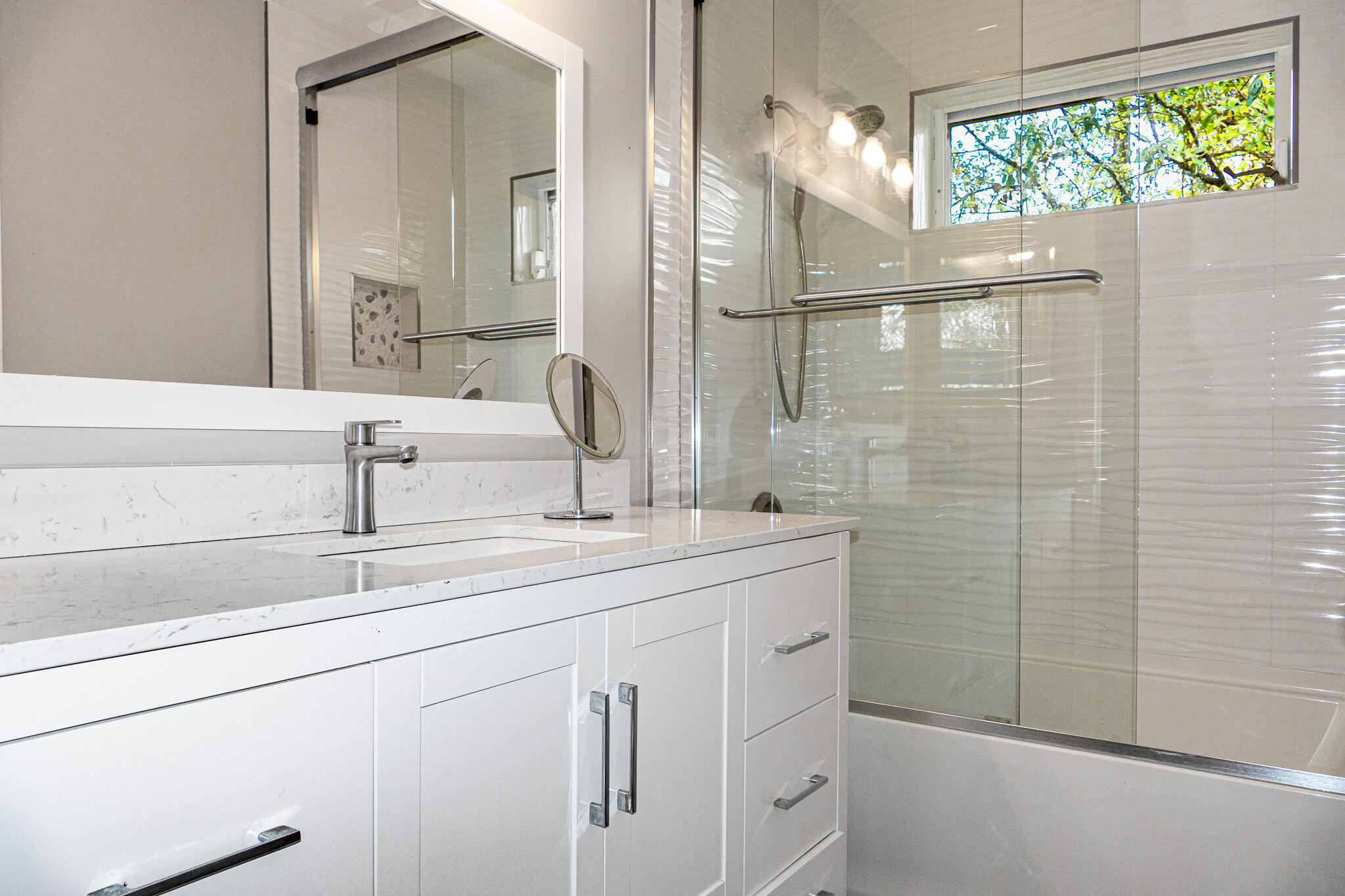 7685 Pleasant Ridge Court Stuart, FL 34997 - Photo 31 of 66 a bathroom with a sink and mirror