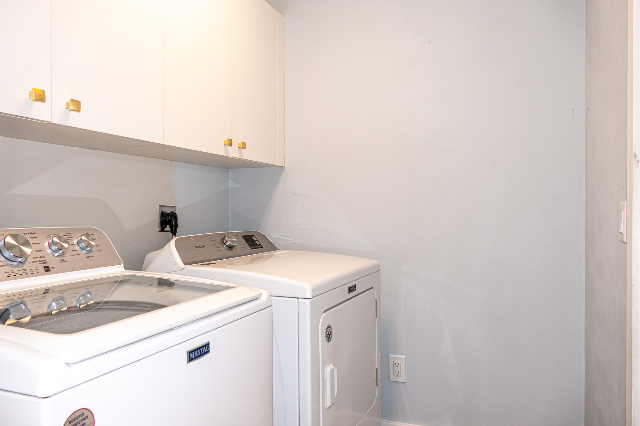 7685 Pleasant Ridge Court Stuart, FL 34997 - Photo 38 of 66 a utility room with dryer and washer