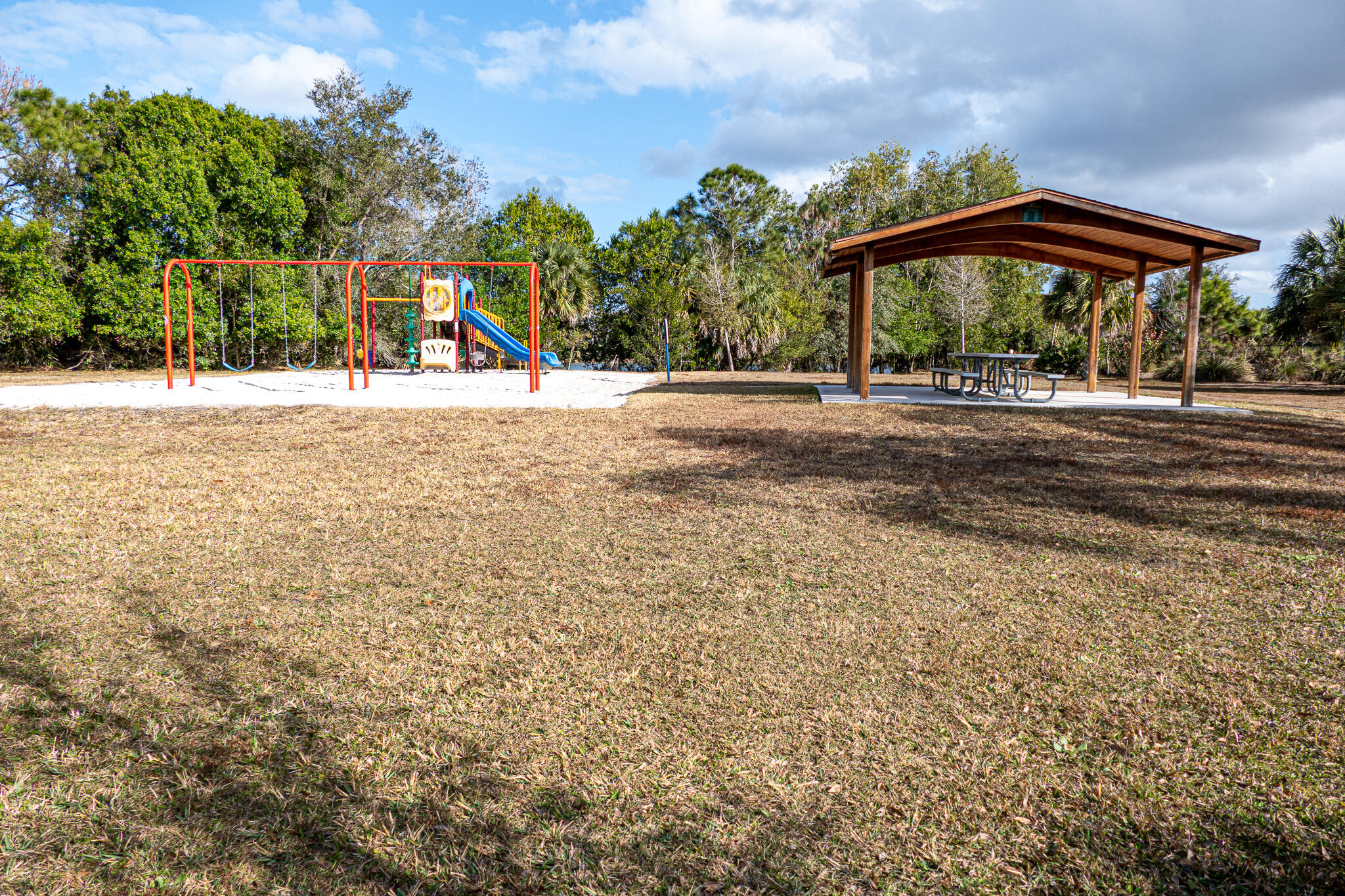 7685 Pleasant Ridge Court Stuart, FL 34997 - Photo 56 of 66 a view of outdoor space with garden and trees