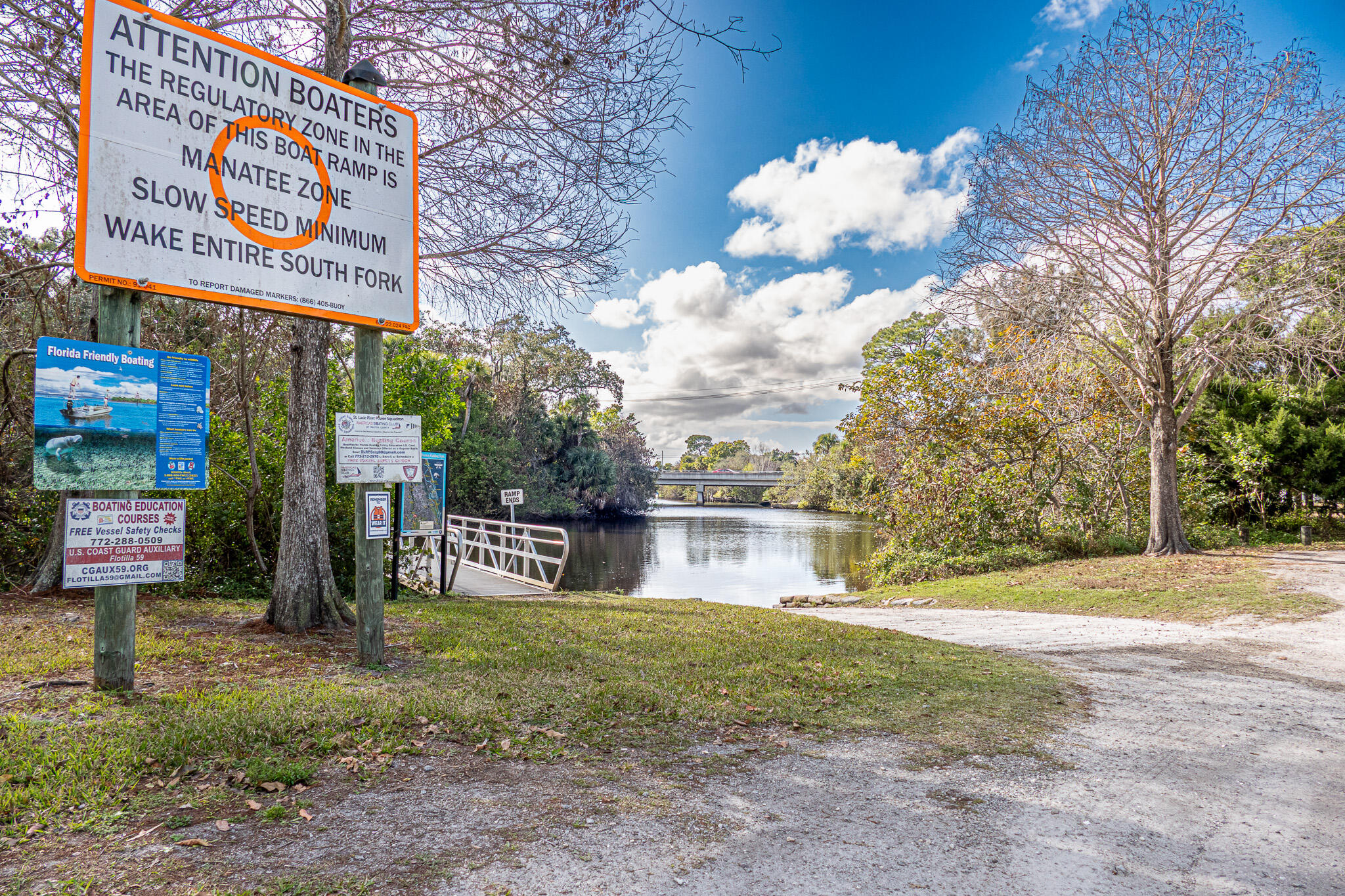 7685 Pleasant Ridge Court Stuart, FL 34997 - Photo 59 of 66 a view of a street with large trees