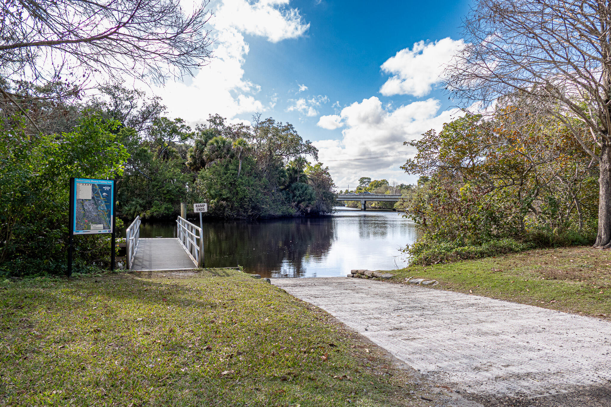 7685 Pleasant Ridge Court Stuart, FL 34997 - Photo 64 of 66 a backyard of a house with lots of green space