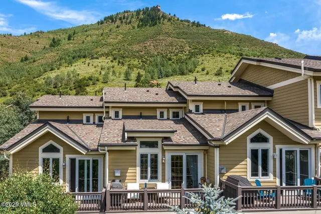 a aerial view of a house with a porch