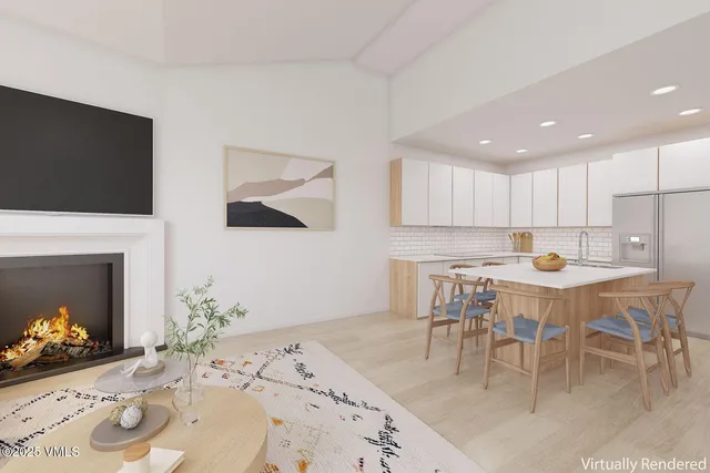 a kitchen with a table and chairs in it