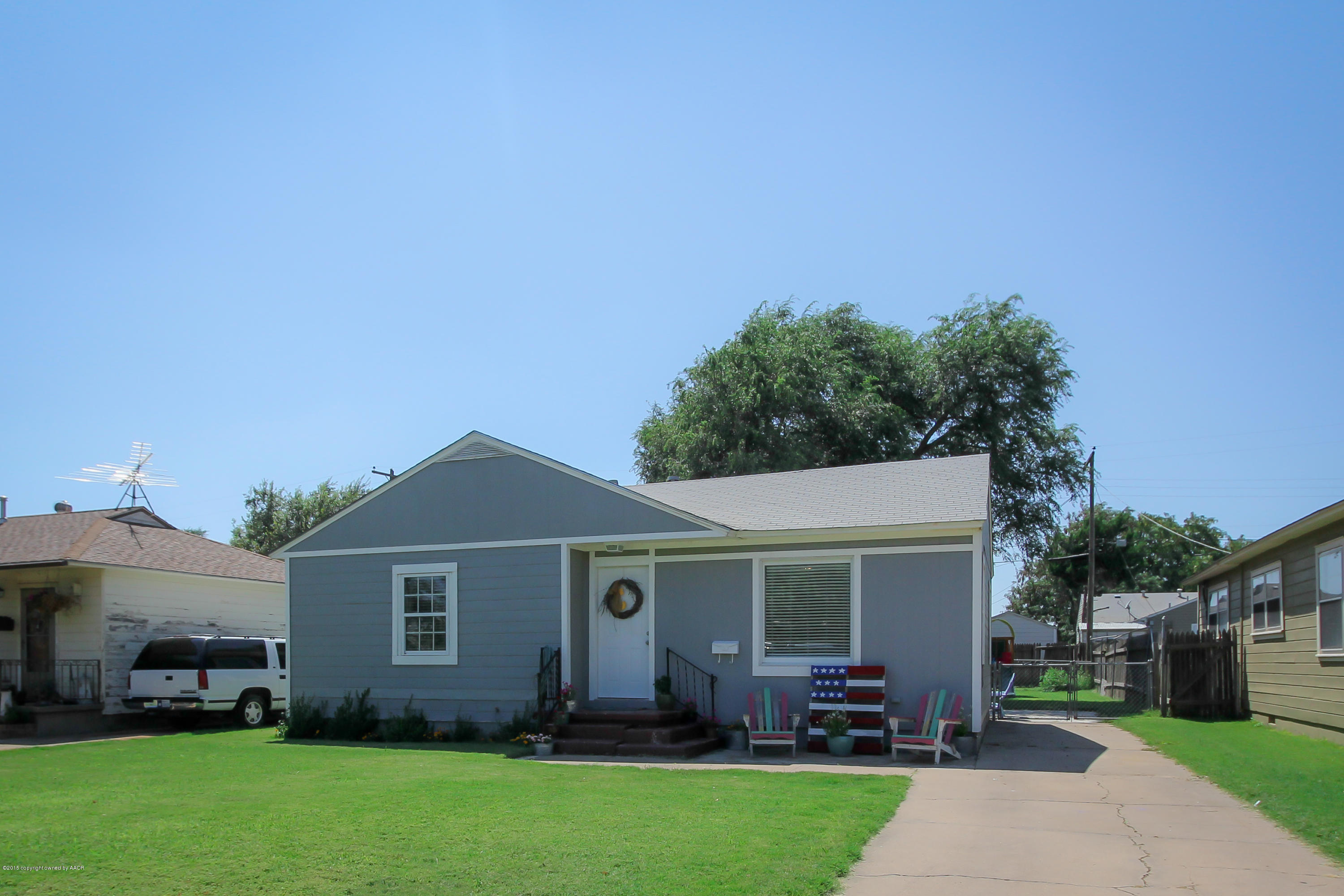 4308 South Monroe Street Amarillo, TX 79110 - Photo 3 of 18 a front view of house with yard and green space