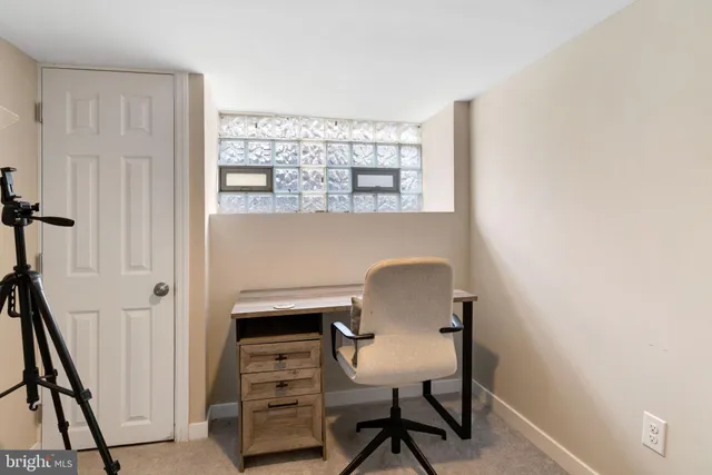 a view of a room with a bathroom