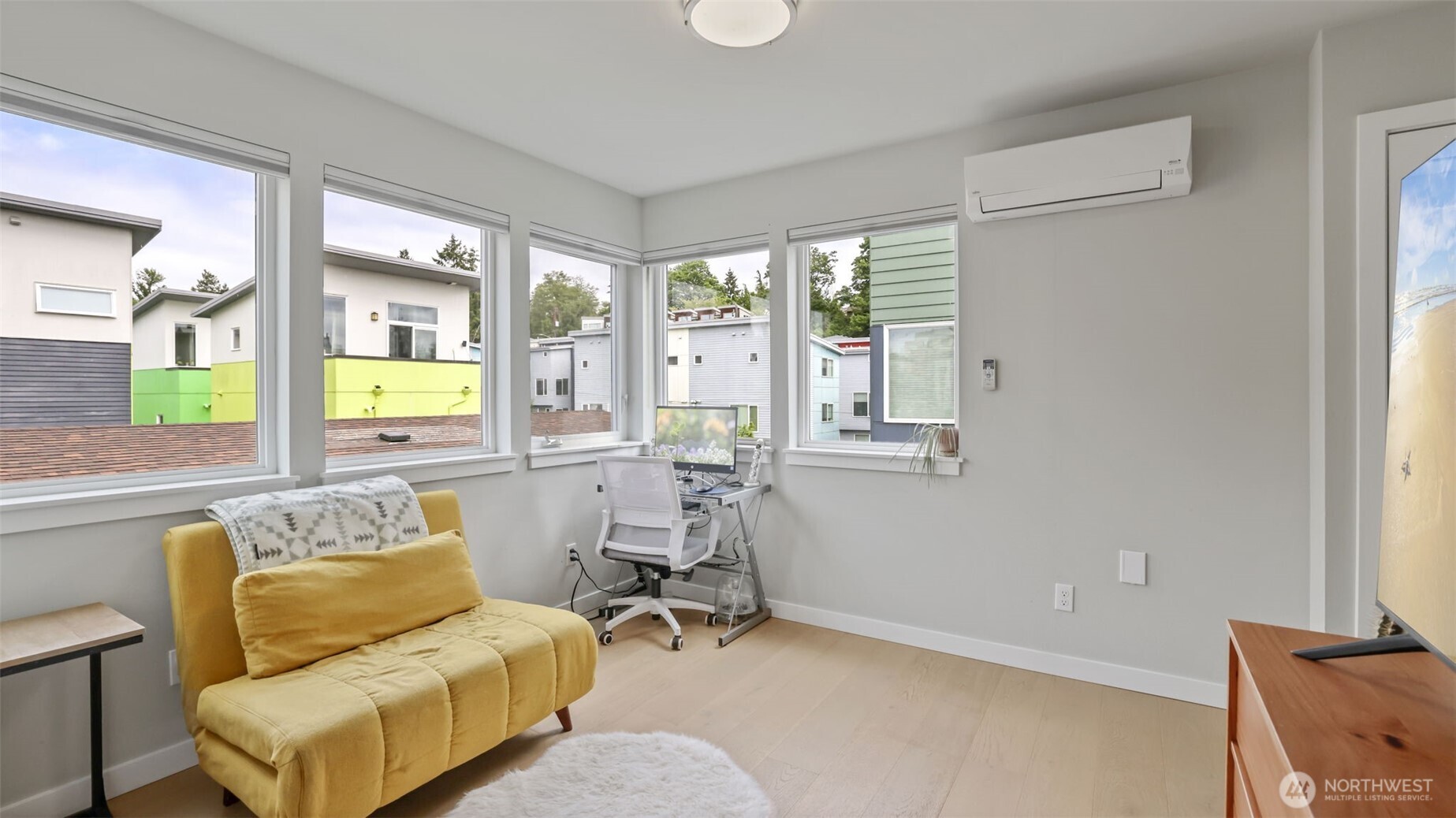 3638 36th Avenue South, Unit B Seattle, WA 98144 - Photo 12 of 19 a living room with furniture and a large window