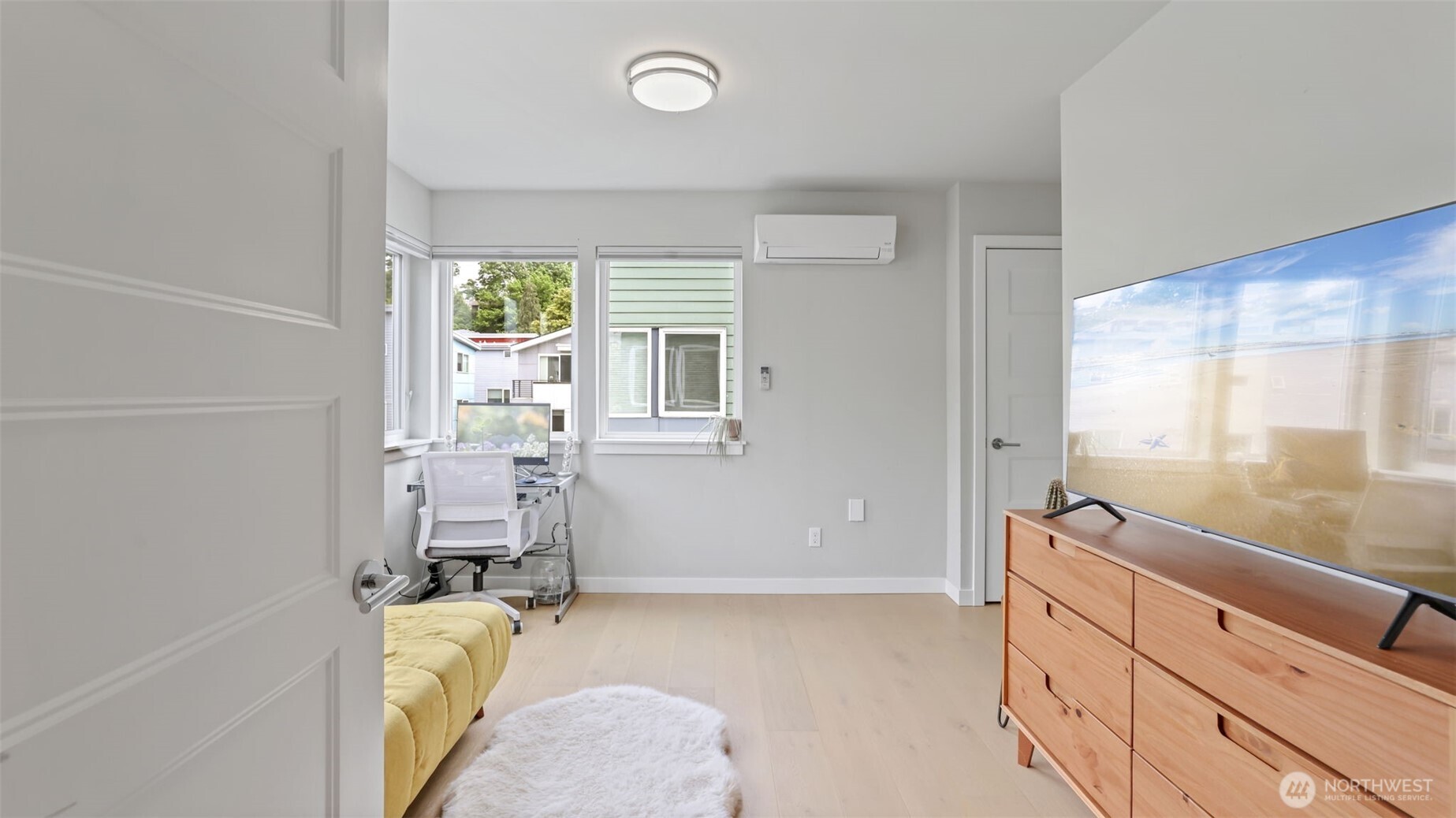 3638 36th Avenue South, Unit B Seattle, WA 98144 - Photo 15 of 19 a room with sink a bed and a window