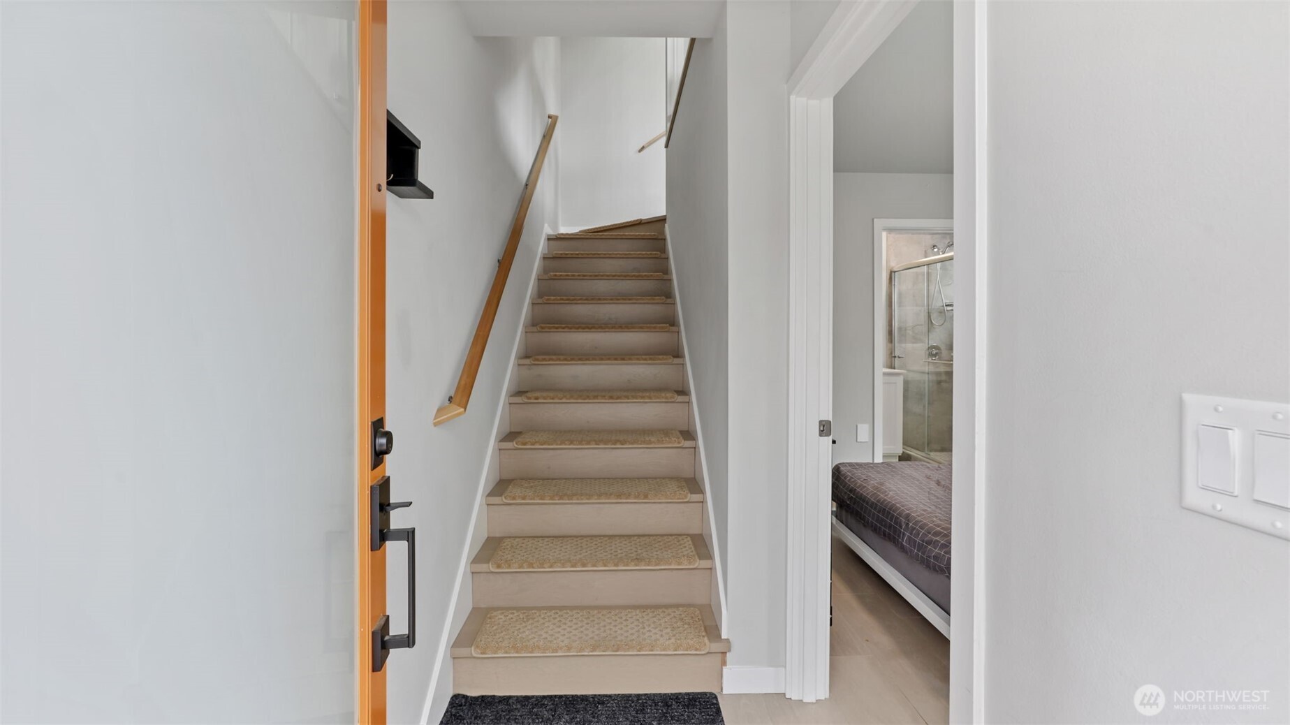 3638 36th Avenue South, Unit B Seattle, WA 98144 - Photo 3 of 19 a view of a hallway with wooden floor and entryway