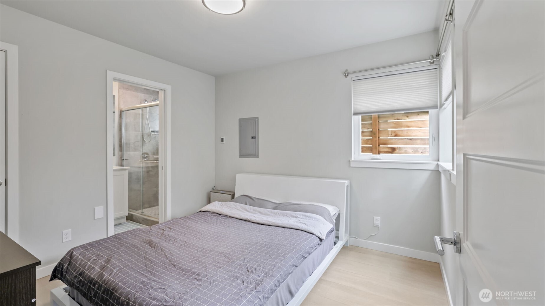 3638 36th Avenue South, Unit B Seattle, WA 98144 - Photo 4 of 19 a bedroom with a bed and a window