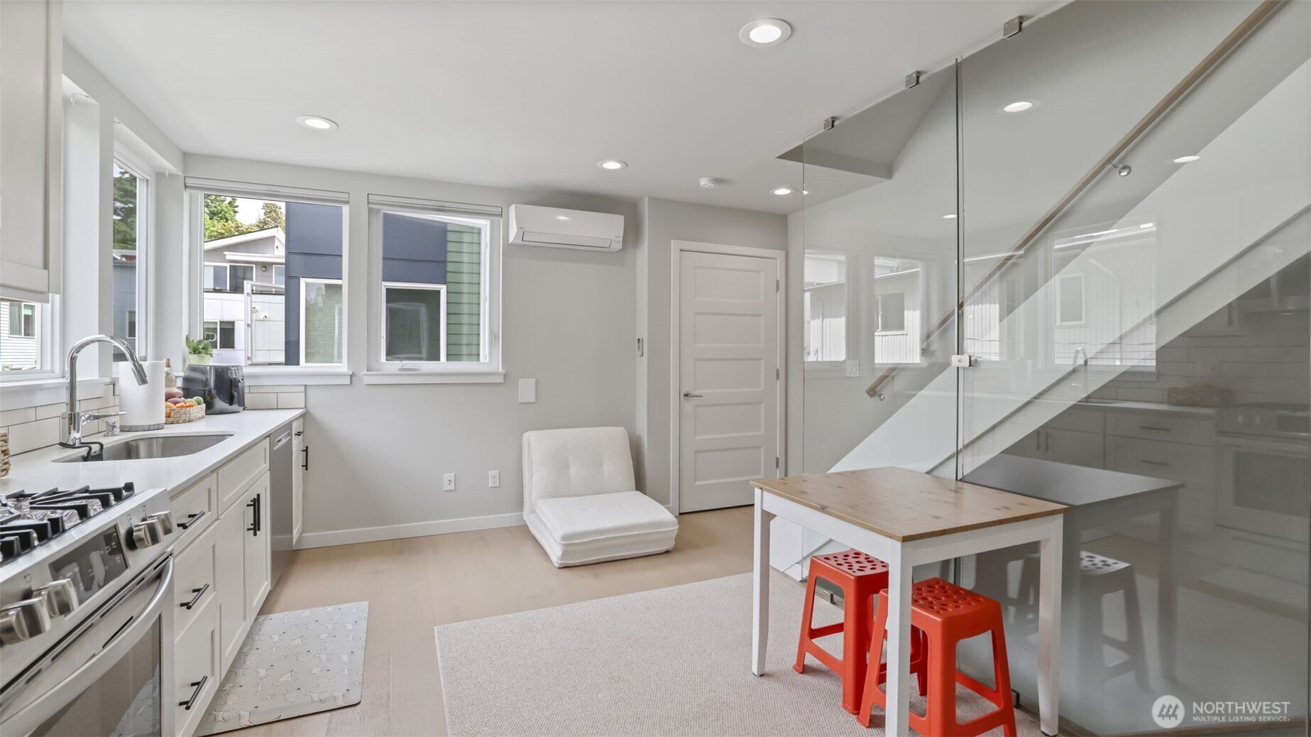 3638 36th Avenue South, Unit B Seattle, WA 98144 - Photo 8 of 19 a living room with furniture and a stove