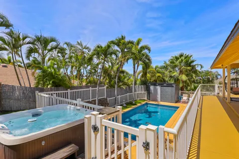 a view of a swimming pool with a patio