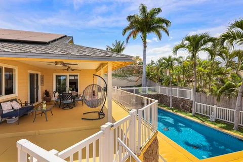 a view of a swimming pool with a patio